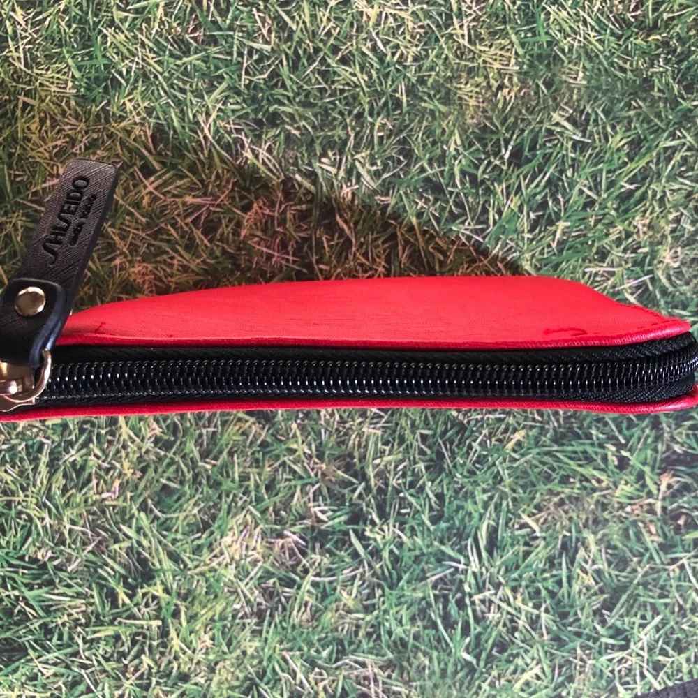 Shiseido Ginza Tokyo Red Makeup Bag with .33 oz Ultimune Deluxe Sample Included